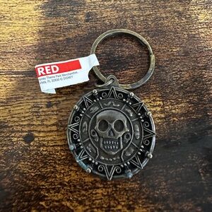 Disney’s Pirates of the Caribbean Pirate Coin Keychain NWT